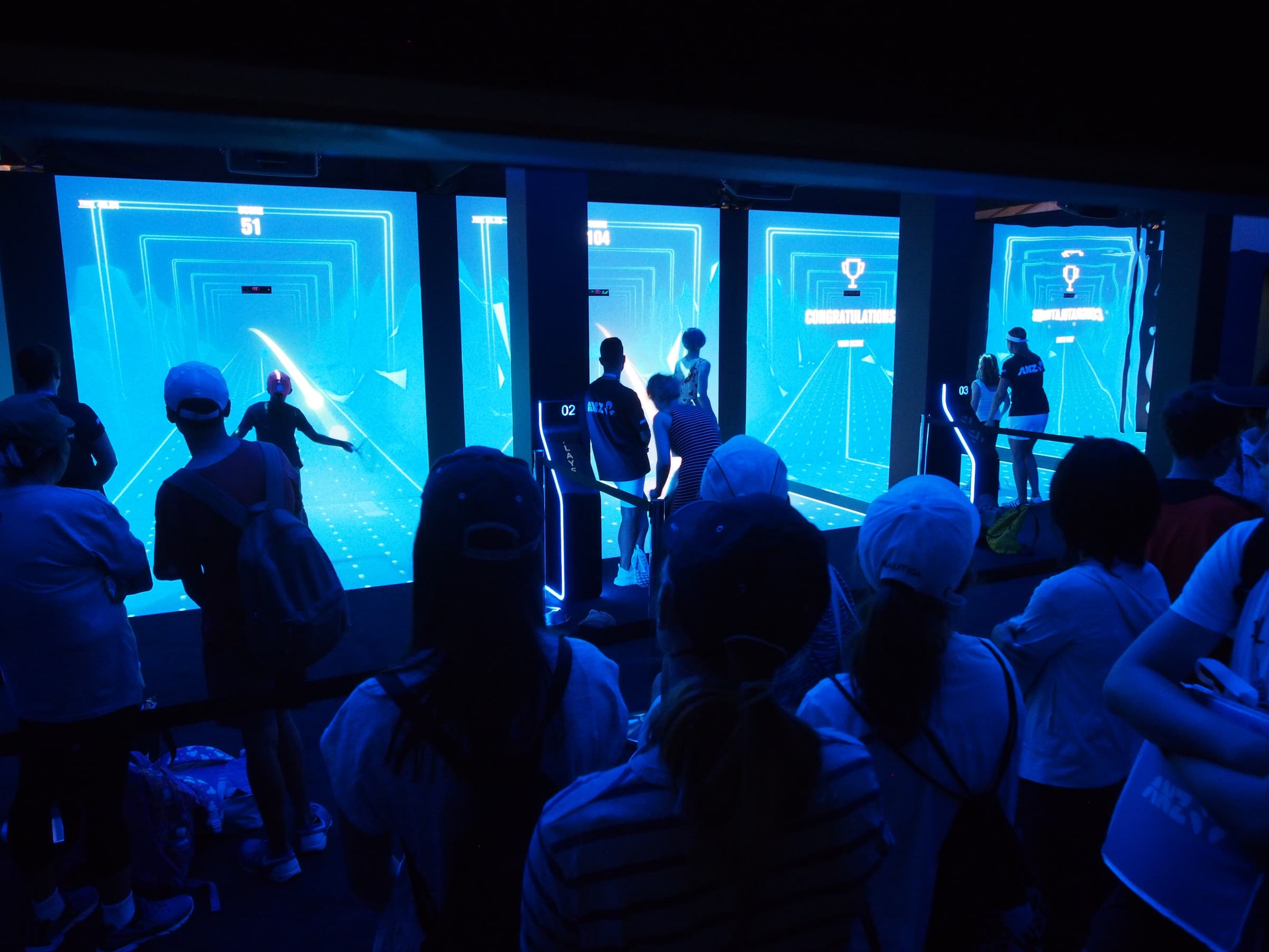 Crowds watching participants play across the ANZ Breakpoint installation at the Australian Open.