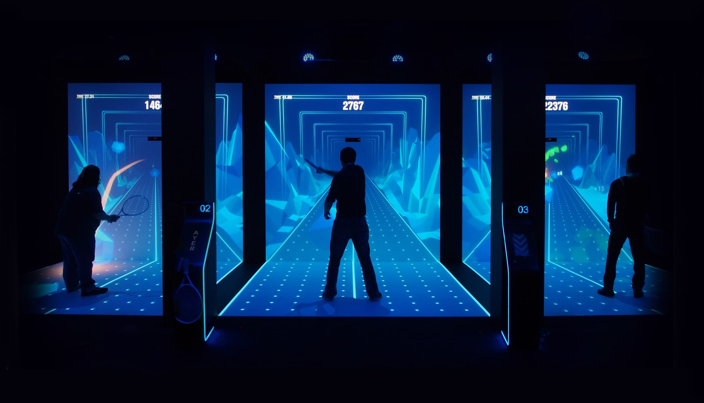 Multiple ANZ Breakpoint projection booths operating side by side with players inside the experience.