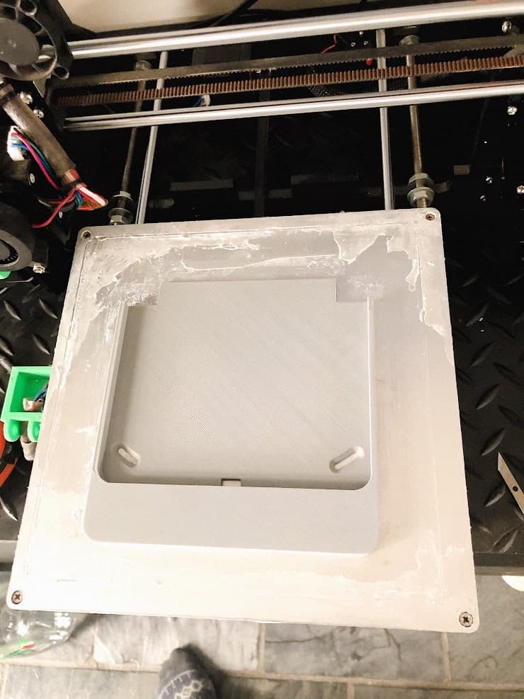 A rough H2.0 component on the 3D-printer bed after an unsuccessful print.