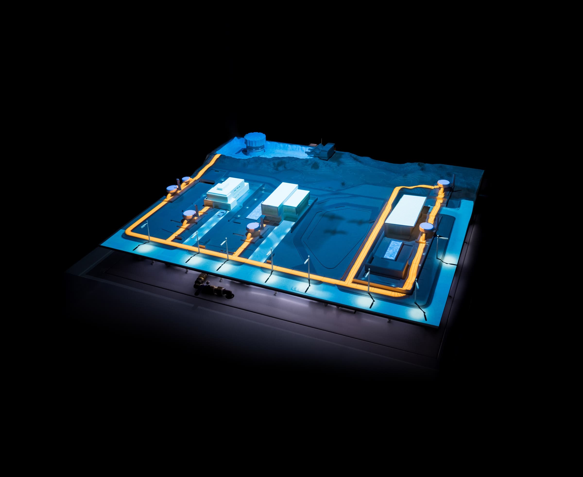 Close view of the physical H2.0 water network with blue and orange projected information across the model.