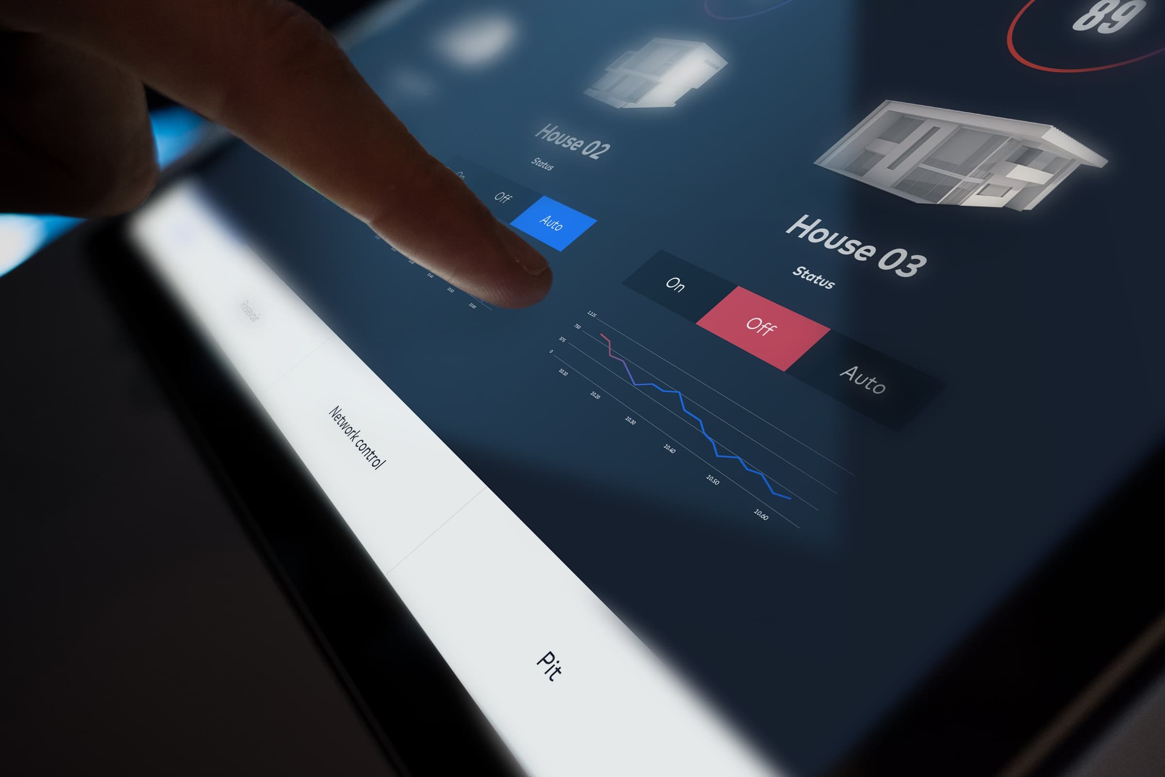 A hand using the H2.0 touchscreen controls to change house status and inspect network information.